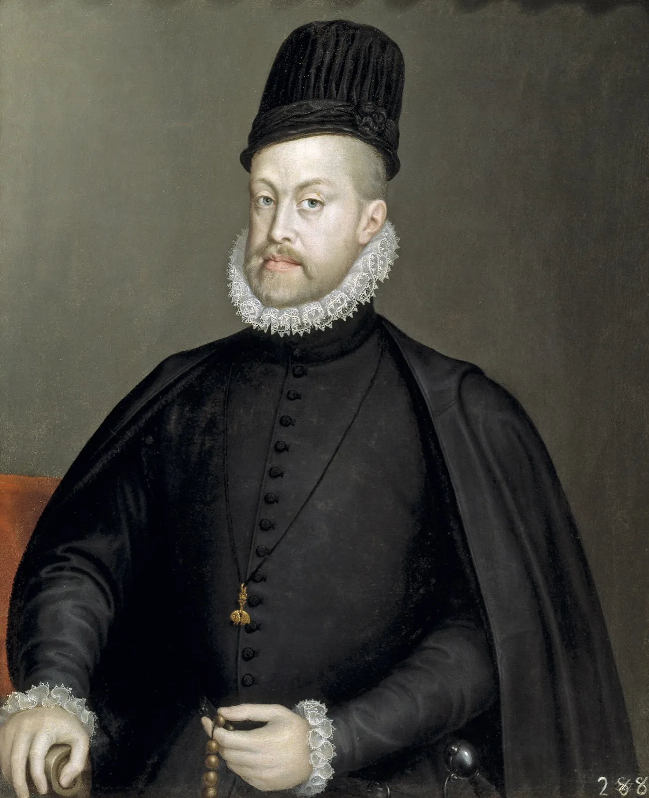 Portrait de Philippe II d'Espagne, en habit noir, fraise et chapeau haut, tenant un chapelet