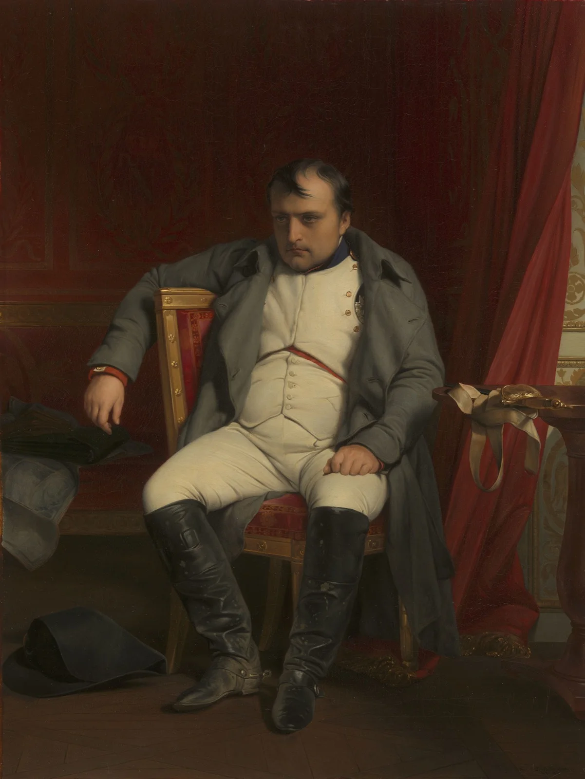 Napoléon assis dans son cabinet du château de Fontainebleau, accablé.